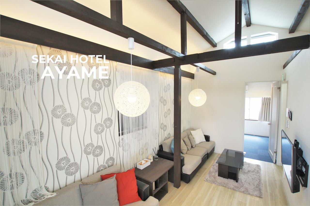 Sekai Hotel Tsuki Осака Екстериор снимка