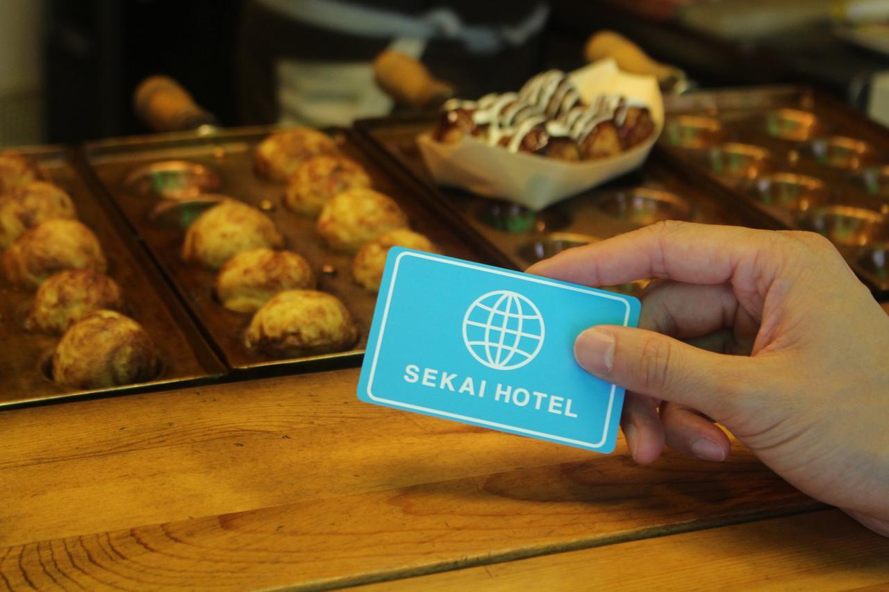 Sekai Hotel Tsuki Осака Екстериор снимка