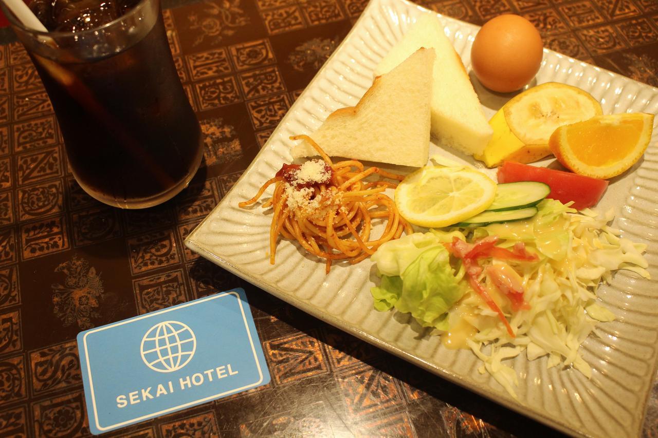 Sekai Hotel Tsuki Осака Екстериор снимка